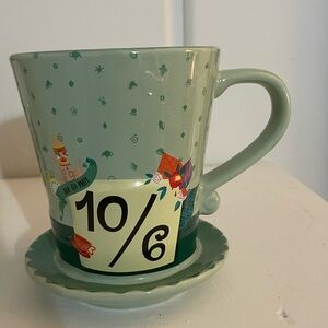 Disney Green Mad Hatter Teacup and Saucer world land Alice in wonderland